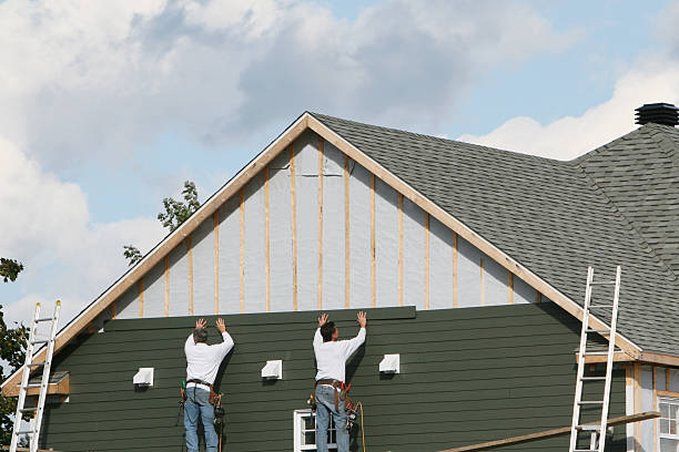 Professional Storm Damage Siding Repair technician working in Mount Ulla, NC